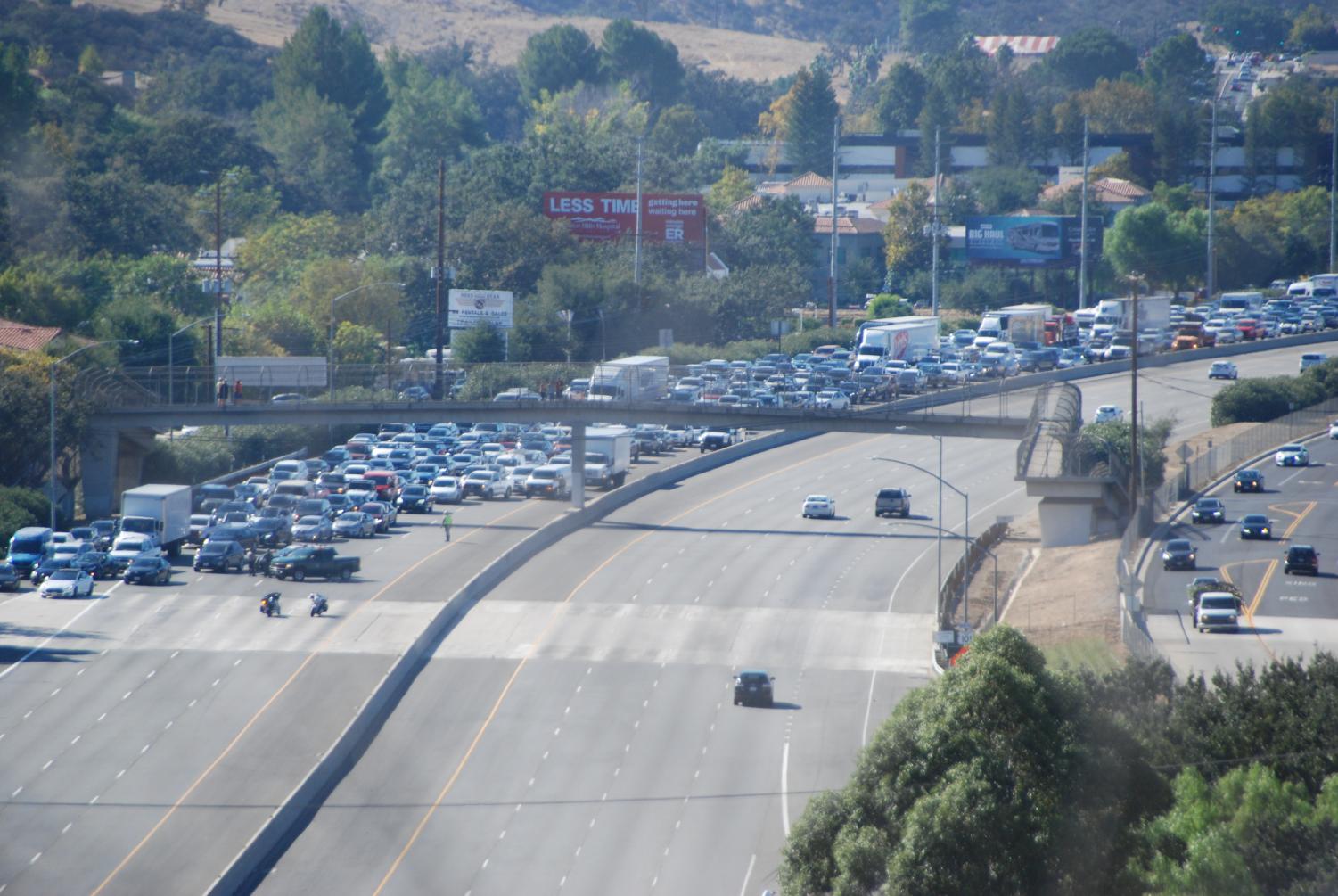 vintage plane hits center divider on 101 freeway