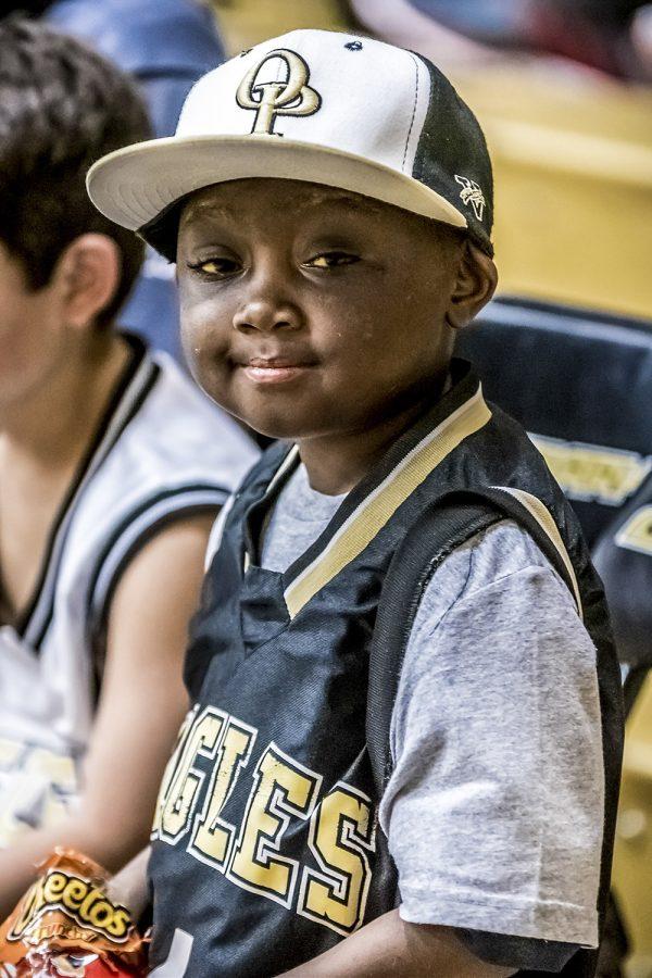 Luc+Bodden+sits+on+the+sideline+during+a+home+basketball+game.+Luc+was+a+beloved+Oak+Park+High+School+basketball+and+football+fan+%28Courtesy+of+Daynao+Olton%29.