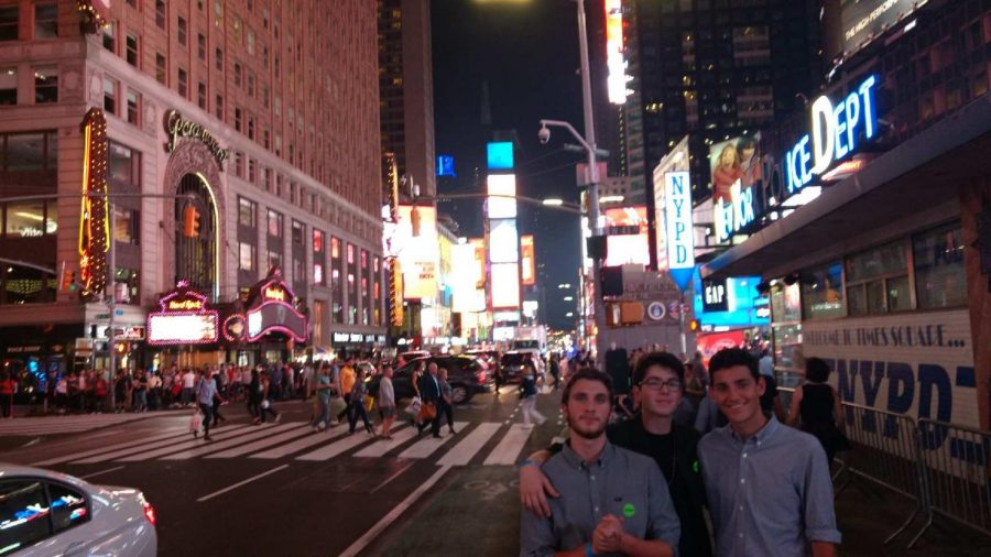 Juniors+Aiden+Glikmann%2C+left%2C+and+Benjamin+Fuller%2C+center%2C+pose+in+Times+Square.+Glikmann+and+Fuller+were+invited+to+participate+in+the+International+High+School+Film+Festival+in+New+York+City+for+their+short-+lm+%E2%80%9CThe+Stall%E2%80%9D+%28photo+courtesy+of+Ben+Fuller%29.