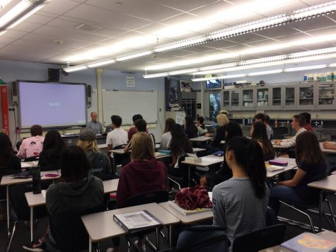 Sloan incorporates meditation into his classes