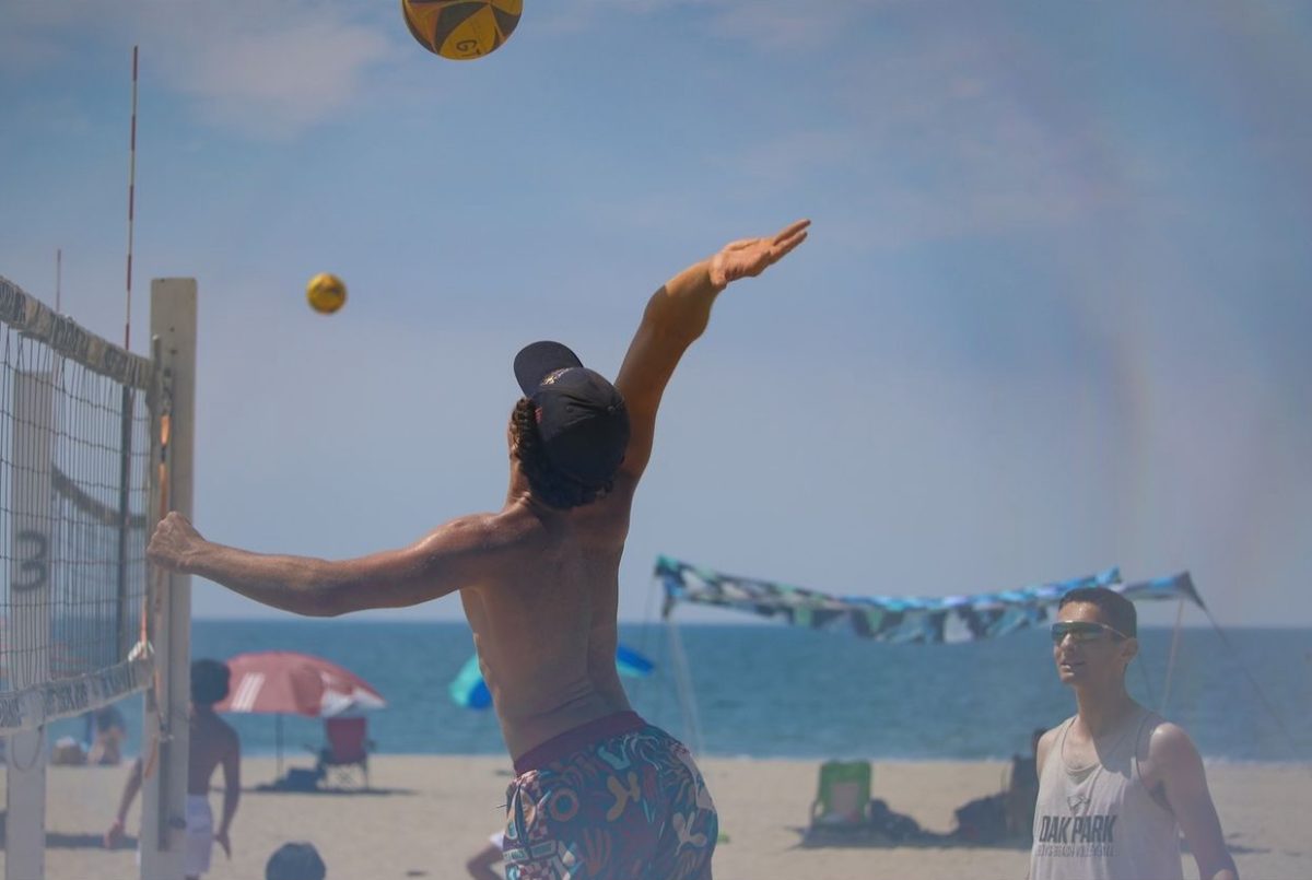 Adam Noy hits the ball at the tournament