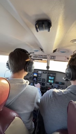 Aviation club president Artem Sodukh flying a plane for his student pilot program