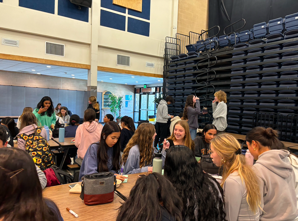 Beginning Peer Counseling gather in the Pavilion to make thank you cards for firefighters, as part of their weekly lunch meeting.