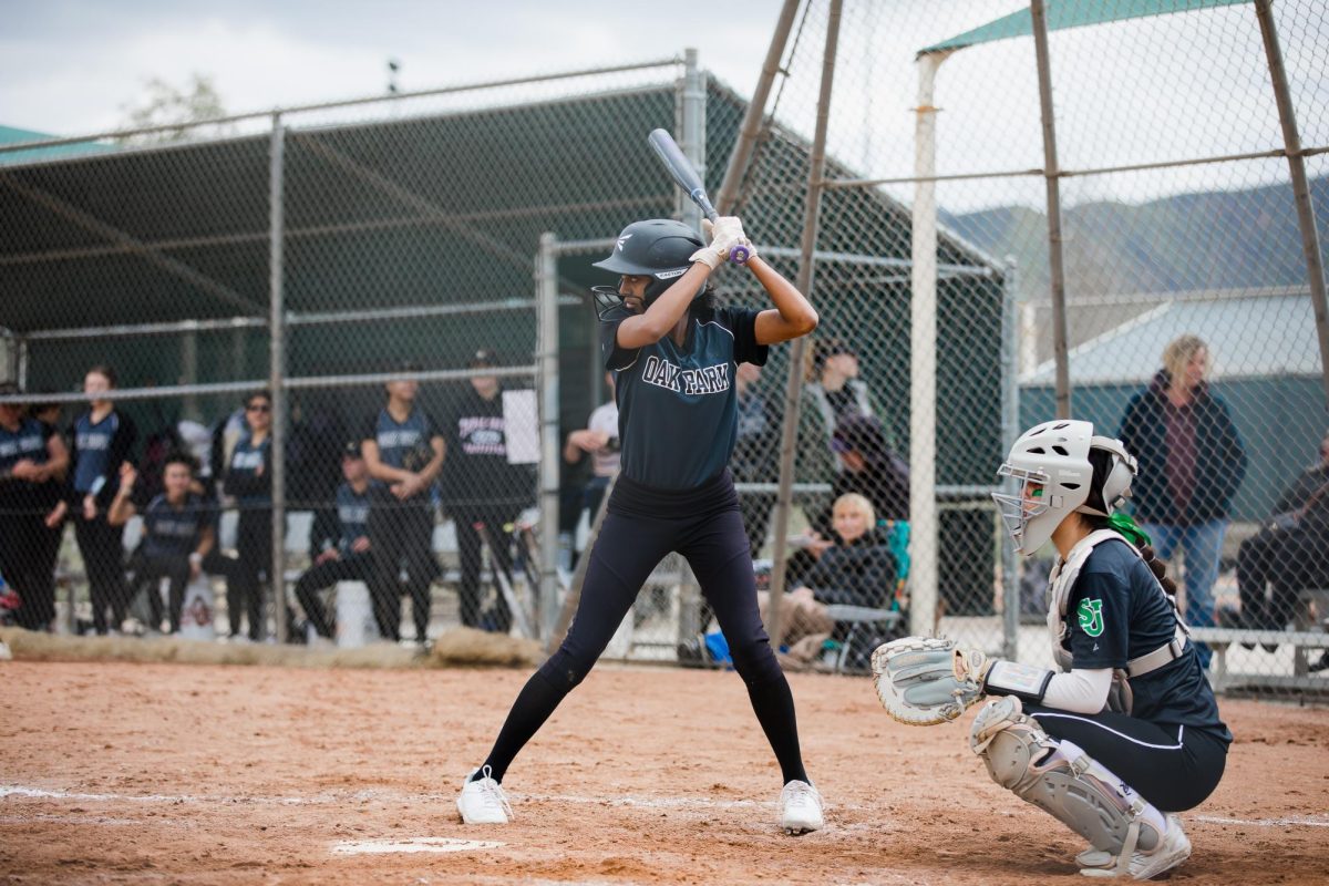 Varsity captain Kirthi Paramasivan at bat