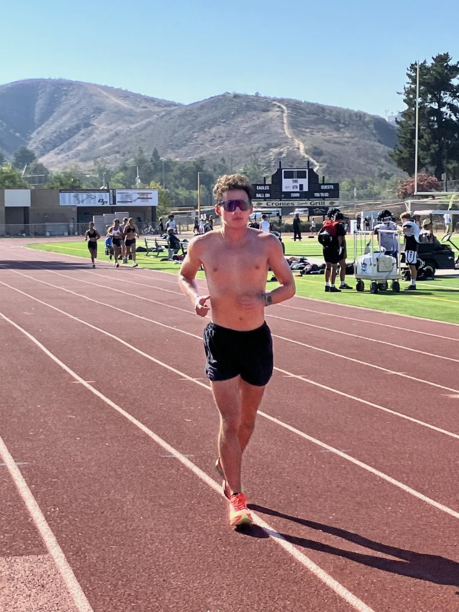 Junior Kean Castaneda finishes his last lap.