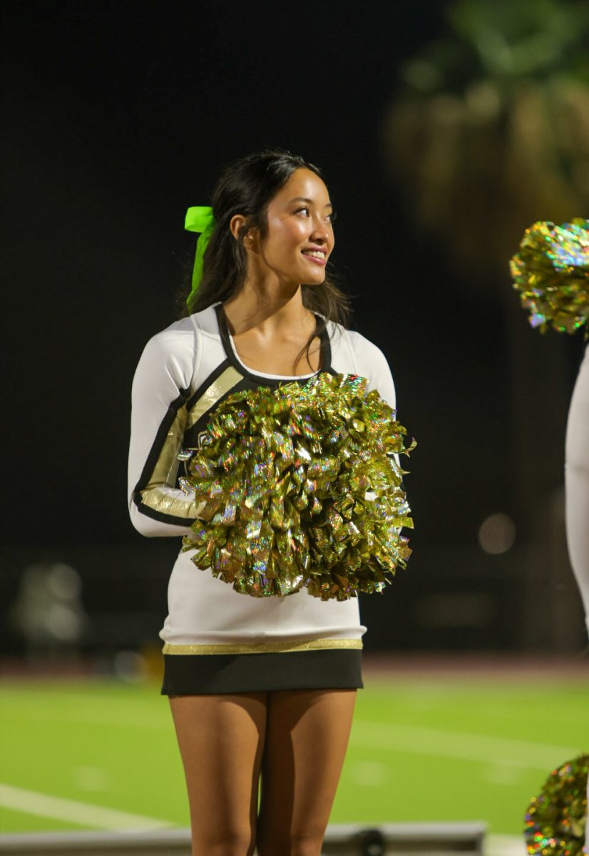 Camacho cheers at an OPHS home game.
