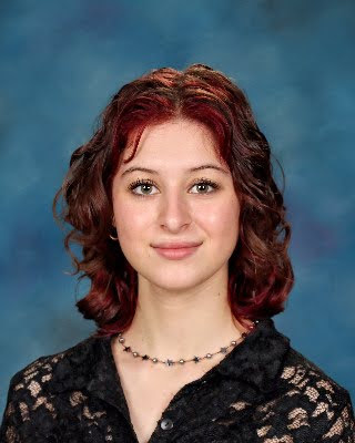 Josie Bartz wears her handmade pearl necklace. 