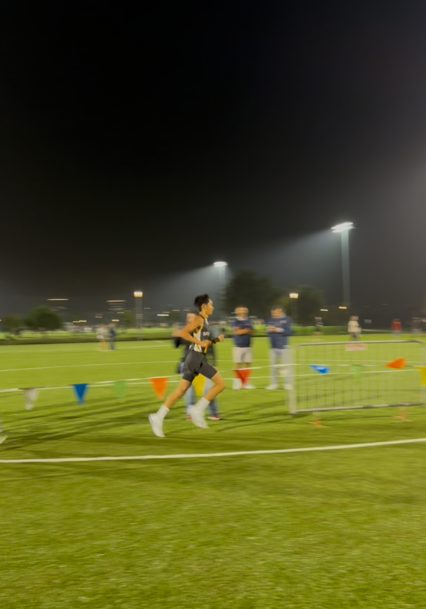 Jaiden Chan running at Woodbridge Invitational (Photo by Milo Labor/OPHS)